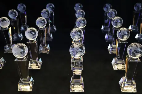 Crystal trophies arranged for an awards presentation